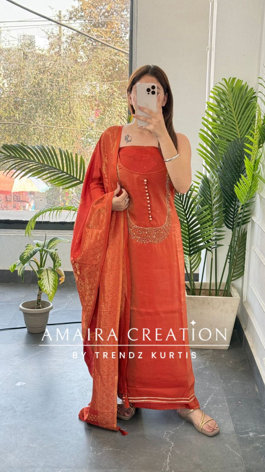 Premium Muslin Shimmer Rust Designer Neckline Unstitched Suit With Banarasi Dupatta