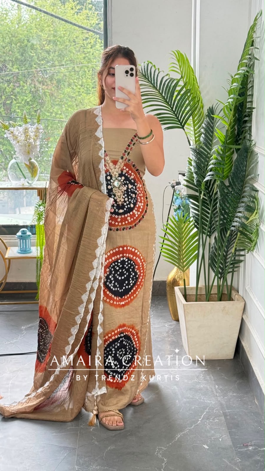 Premium Cotton Beige Black colour Bandhni detailing unstitch suit with beautiful dupatta.