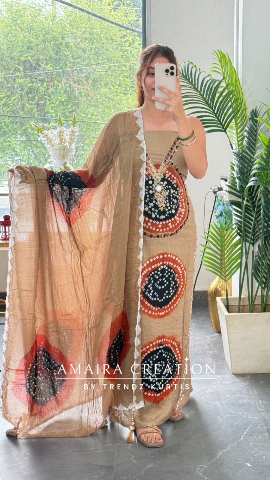 Premium Cotton Beige Black colour Bandhni detailing unstitch suit with beautiful dupatta.
