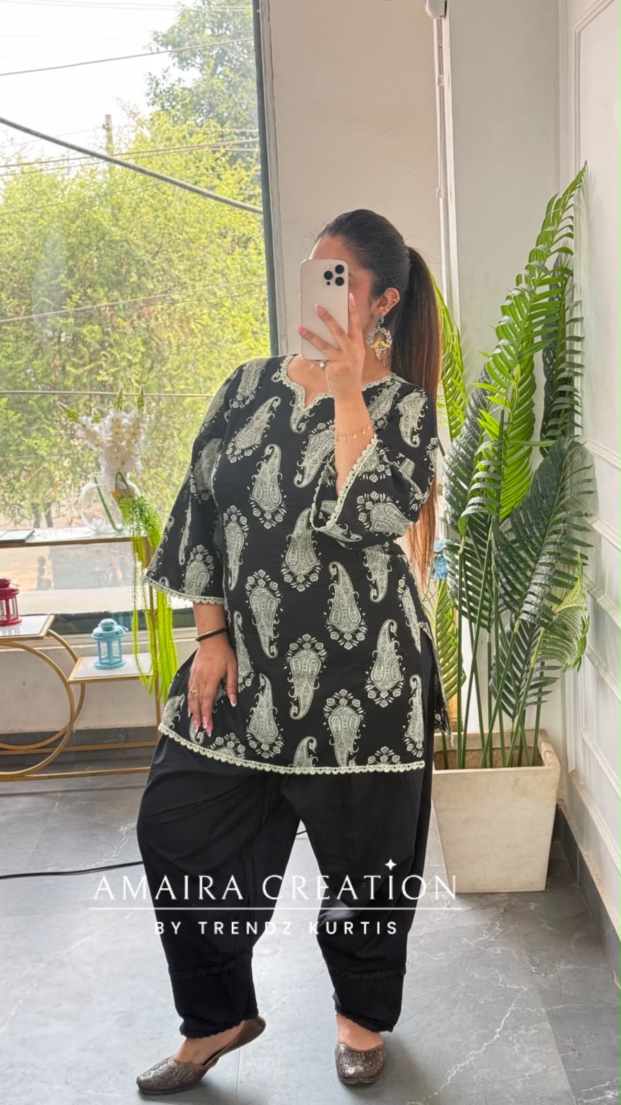 Paisley Printed Black Cotton Short Kurti with Back Knot Dori